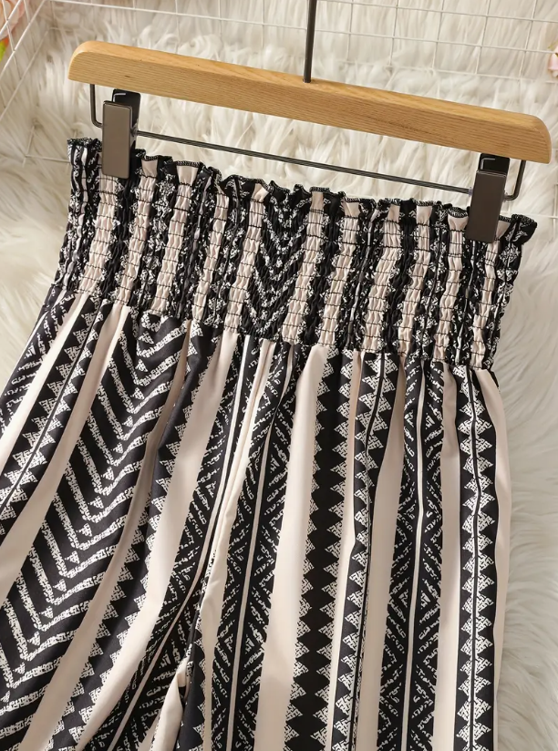 Pantalon large femme à rayures noires et blanches avec taille smockée